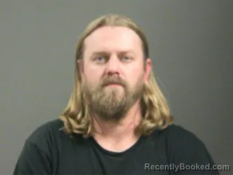 Mugshot of Joshua Kloster booked in Washington County, Arkansas on March 17, 2026