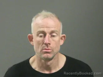 Mugshot of Christopher Gillean booked in Washington County, Arkansas on March 19, 2026