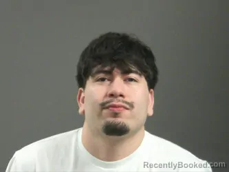 Mugshot of Cristian Godinez-Aldaco booked in Washington County, Arkansas on March 19, 2026