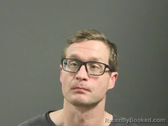 Mugshot of Cyrus Bond booked in Washington County, Arkansas on March 19, 2026