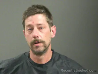 Mugshot of Justin Mcelwain booked in Washington County, Arkansas on March 21, 2026