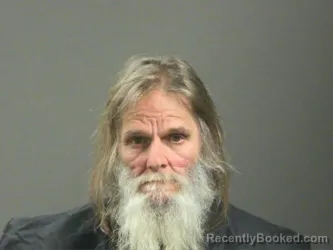 Mugshot of Butch Cozine booked in Washington County, Arkansas on March 21, 2026