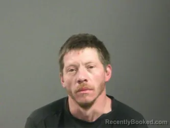 Mugshot of Clarence Moore booked in Washington County, Arkansas on March 24, 2026