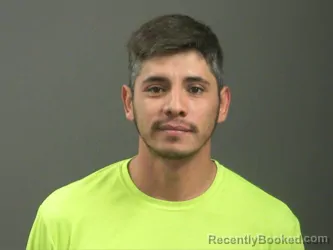 Mugshot of Wilber Flores-Flores booked in Washington County, Arkansas on March 25, 2026