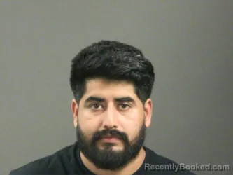 Mugshot of Omar Hernandez-Diaz booked in Washington County, Arkansas on March 25, 2026