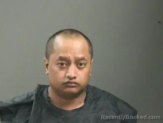 Mugshot of Hervin Alfons booked in Washington County, Arkansas on March 25, 2026