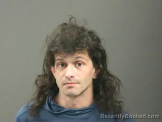 Mugshot of Joseph Flores booked in Washington County, Arkansas on March 26, 2026