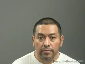Mugshot of Oscar Perez-Flores booked in Washington County, Arkansas on March 26, 2026