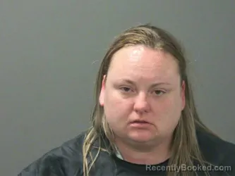 Mugshot of Ashley Hignite booked in Washington County, Arkansas on March 27, 2026