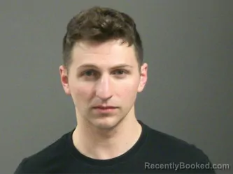 Mugshot of Jonathan Hrach booked in Washington County, Arkansas on March 28, 2026