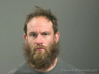 Mugshot of Joshua Elliott booked in Washington County, Arkansas on March 29, 2026