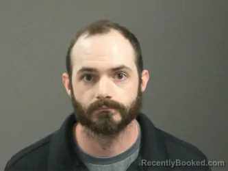 Mugshot of Collyn Harlan booked in Washington County, Arkansas on March 30, 2026