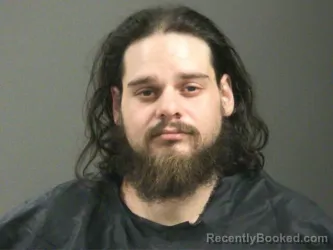 Mugshot of Eli Scarbrough booked in Washington County, Arkansas on March 30, 2026