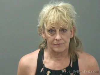 Mugshot of Kelly Faria booked in Washington County, Arkansas on March 31, 2026