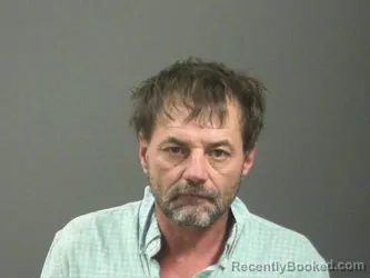 Mugshot of James Nosser booked in Washington County, Arkansas on April 1, 2026