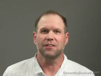 Mugshot of John Phillips booked in Washington County, Arkansas on April 1, 2026