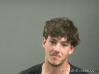 Mugshot of Jacob Lewis booked in Washington County, Arkansas on April 1, 2026