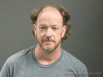 Mugshot of Dustin Gamble booked in Washington County, Arkansas on April 2, 2026