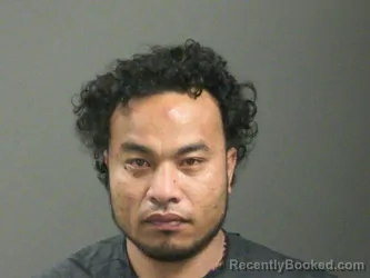 Mugshot of Alokoa Lajar booked in Washington County, Arkansas on April 5, 2026