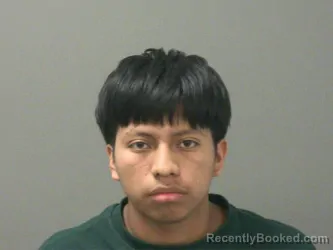 Mugshot of Miguel Xan Xiquin booked in Washington County, Arkansas on April 7, 2026