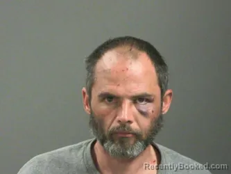 Mugshot of Joshua Dewitt booked in Washington County, Arkansas on April 7, 2026