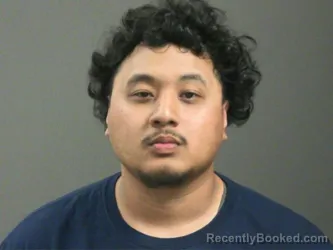 Mugshot of Junia Bolkeim booked in Washington County, Arkansas on April 15, 2026