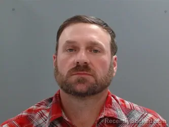 Mugshot of John Moulton booked in Washington County, Arkansas on May 17, 2026