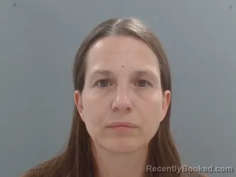 Mugshot of Melinda Cozine booked in Washington County, Arkansas on May 18, 2026