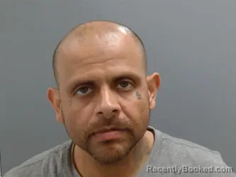Mugshot of Isidro Figueroa booked in Washington County, Arkansas on May 19, 2026
