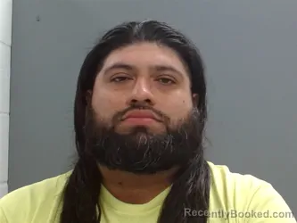 Mugshot of Adan Melchor-Garcia booked in Washington County, Arkansas on May 21, 2026