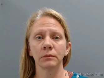 Mugshot of Michelle Coe booked in Washington County, Arkansas on May 22, 2026