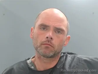 Mugshot of Joshua Dewitt booked in Washington County, Arkansas on May 25, 2026