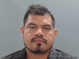 Mugshot of Juvenal Pacheco-Garcia booked in Washington County, Arkansas on May 27, 2026