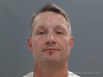 Mugshot of Kenneth Perkins booked in Washington County, Arkansas on May 31, 2026