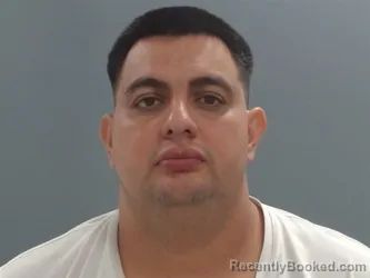 Mugshot of Edwin Flores booked in Washington County, Arkansas on June 2, 2026
