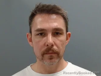 Mugshot of John Wynn booked in Washington County, Arkansas on June 9, 2026