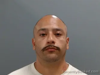 Mugshot of Edgar Martinez booked in Washington County, Arkansas on June 9, 2026