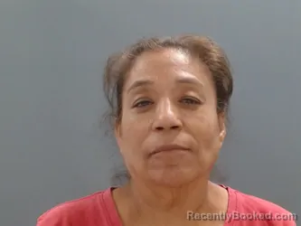 Mugshot of Gloria Cruz booked in Washington County, Arkansas on July 12, 2026