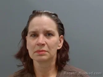 Mugshot of Maggie Napier booked in Washington County, Arkansas on July 27, 2026