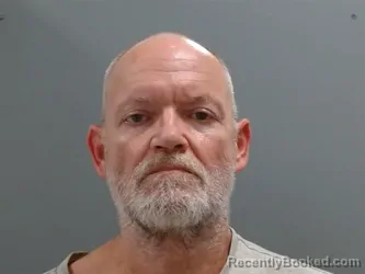 Mugshot of Johnny Evans booked in Washington County, Arkansas on July 28, 2026