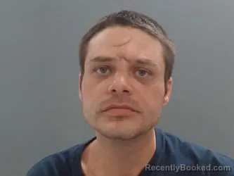 Mugshot of Justin Kraft booked in Washington County, Arkansas on July 29, 2026