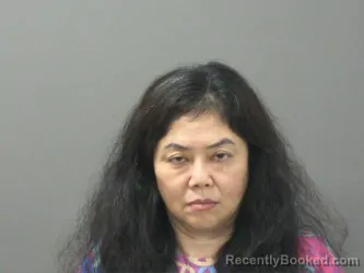 Mugshot of Min Chen booked in Washington County, Arkansas on July 29, 2026