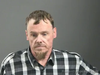 Mugshot of Charles Reed booked in Washington County, Arkansas on August 4, 2026