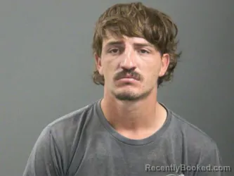 Mugshot of Garrett Doss booked in Washington County, Arkansas on August 4, 2026