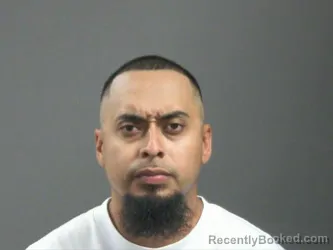 Mugshot of Julio Rodriguez booked in Washington County, Arkansas on August 6, 2026