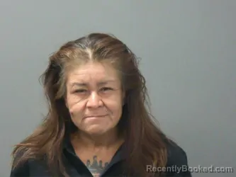 Mugshot of Michelle Smith booked in Washington County, Arkansas on August 7, 2026