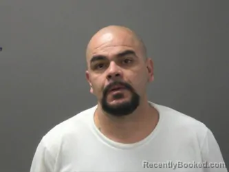 Mugshot of Efrain Alaniz booked in Washington County, Arkansas on August 7, 2026