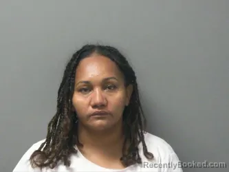 Mugshot of Iris Oliva Gutierrez booked in Washington County, Arkansas on August 7, 2026