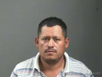 Mugshot of Carlos Montecinos-Martir booked in Washington County, Arkansas on August 9, 2026