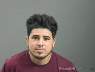 Mugshot of Olmin Andino-Carrasco booked in Washington County, Arkansas on August 9, 2026